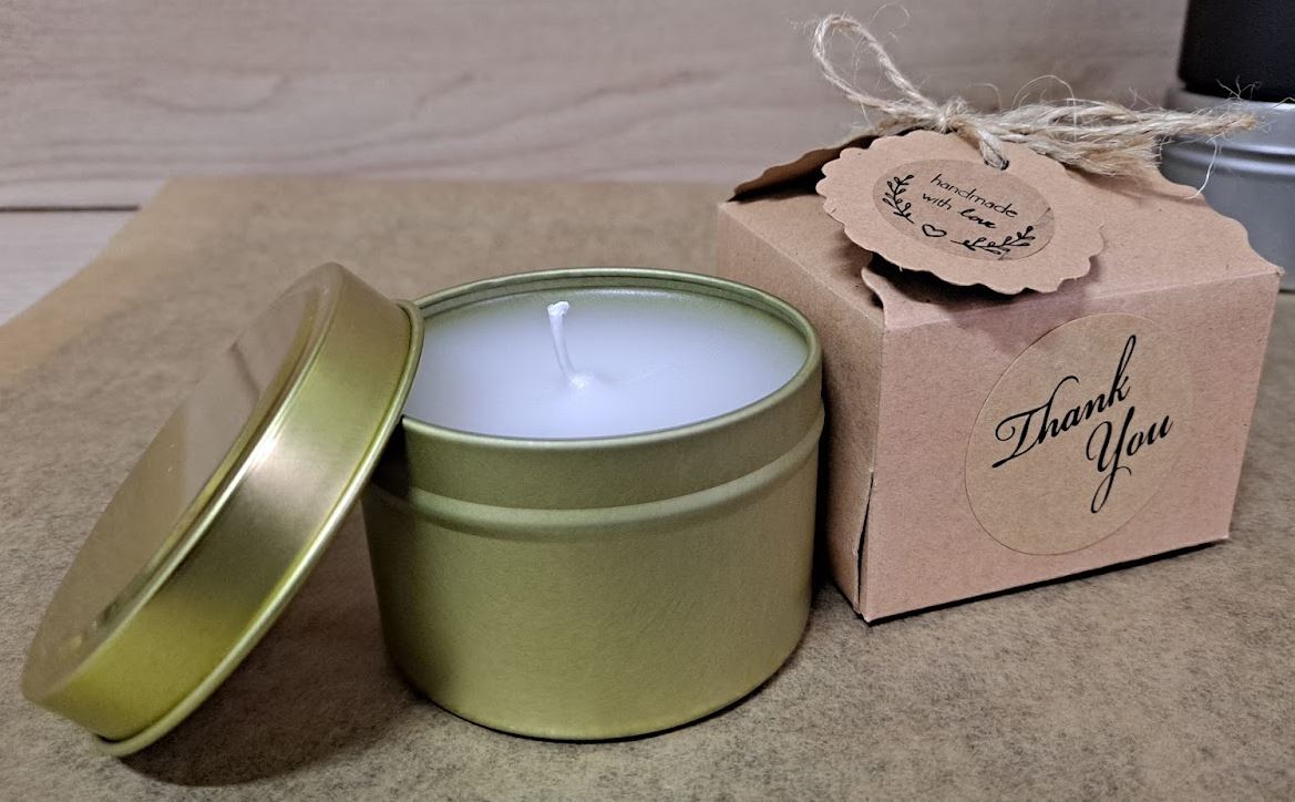 Vela de cera de abeja en caja metálica